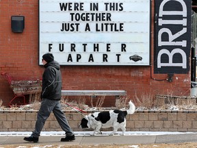 Artist Keli Pollack posted this message on the Bridgeland Market sign board to encourage Calgarians as they deal with the COVID-19 pandemic on Tuesday, March 24, 2020.  Gavin Young/Postmedia