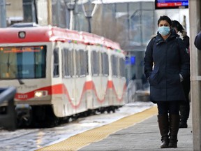 Calgary Transit passengers wait for a CTrain in downtown Calgary on Tuesday, March 31, 2020. The COVID-19 pandemic has meant a big drop ridership resulting in service changes. Gavin Young/Postmedia