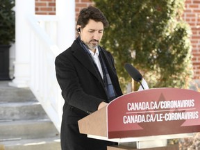 Prime Minister Justin Trudeau arrives to speak at a press conference on COVID-19 at Rideau Cottage, in Ottawa, on Saturday, March 21, 2020.