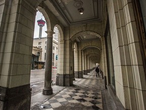 An empty sidewalk outside The Bay building in downtown Calgary on Tuesday, March 24, 2020.