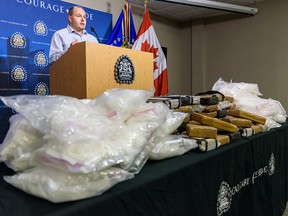 Calgary police display cocaine and crystal methamphetamine seized from a vehicle near Drumheller during a press conference on Feb. 4, 2020.