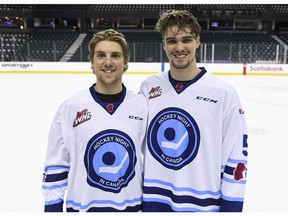 Hitmen forward Cael Zimmerman and defenceman Jackson van de Leest wearing the special edition Hockey Night in Canada jerseys. Photo by Candice Ward/Calgary Hitmen. The Calgary Hitmen Hockey Club will wear specially-designed Hockey Night in Canada jerseys on Sunday, Mar. 15 at 2:00 p.m., when they host the Red Deer Rebels at the Scotiabank Saddledome. It's all part of WHL Suits Up to Promote Organ Donation, presented by RE/MAX, which sees all 17 Canadian Western Hockey League markets host this awareness game.