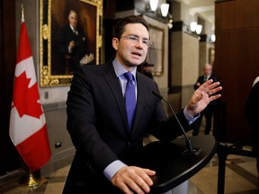 In this Dec. 16, 2019, file photo, Conservative Party of Canada Member of Parliament Pierre Poilievre reacts to the government's fiscal update in Ottawa