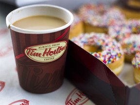 Tim Hortons will temporarily stop accepting reusable cups brought in by customers.