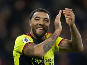 Watford's Troy Deeney applauds fans as he celebrates at the end of the match   REUTERS/David Klein