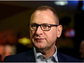 Calgary Flames General Manager Brad Treliving speaks with the media after the teamÕs 40th season luncheon at Scotiabank Saddledome on Monday, March 9, 2020. Azin Ghaffari/Postmedia