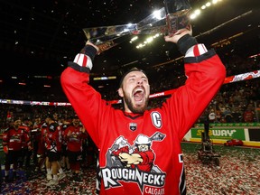 Calgary Roughnecks' Dan MacRae celebrates after winning last year's NLL championship.