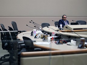 Calgary Mayor Naheed Nenshi was the only member of council in council chambers on Monday, April 6. The rest of council took part from home amidst COVID-19 precautions. Photo by Gavin Young/Postmedia.