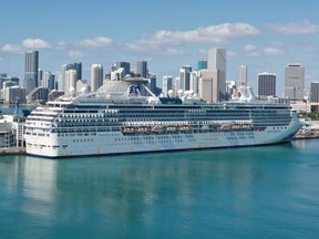 An aerial view from a drone shows the cruise ship Coral Princess after it docked at Port Miami on Saturday, April 4, 2020 in Miami, Fla.