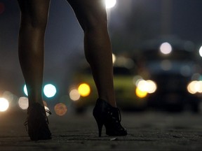 Prostitute at Atlantica avenue in copacabana beach, Rio de Janeiro