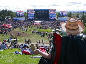 Fans watch the Hunter Brothers perform at Country Thunder in Calgary on Aug. 17, 2019.