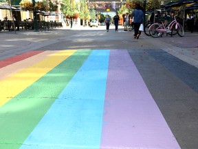 The Pride Walk in Calgary on Stephen Ave. mall and Centre Str. was vandalized overnight but quickly repainted in Calgary on Sunday, August 18, 2019. Darren Makowichuk/Postmedia