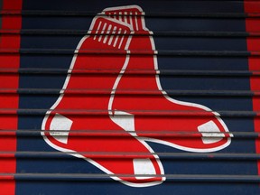 The Red Sox logo seen outside Fenway Park on what would have been the home opening day for the Boston Red Sox against the Chicago White Sox, on April 2, 2020 in Boston.