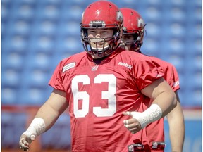 Pierre Lavertu grins during the Calgary Stampeders rookie camp at McMahon Stadium in Calgary, Alta., on Friday, May 30, 2014. Lyle Aspinall/Calgary Sun/QMI Agency