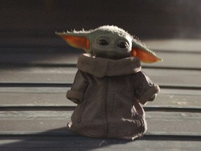 The Child, better known to audiences as "Baby Yoda", is seen in an undated still image from the Disney+ series "The Mandalorian" provided to Reuters February 5, 2020.