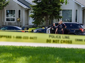 Police are investigating the scene of a shooting on Doverdale Crescent S.E. on Wednesday, May 27, 2020.