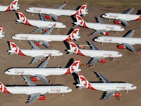 Decommissioned and suspended Air Canada commercial aircrafts are seen stored in Pinal Airpark on May 16, 2020 in Marana, Arizona.