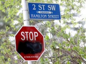 Bilingual stop signs in Mission have been vandalized in Calgary on Saturday, May 23, 2020. Darren Makowichuk/Postmedia