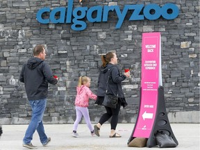 A steady flow of people enter the Calgary Zoo as it opened in Calgary on Saturday, May 23, 2020.