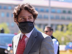 In this file photo Prime Minister Justin Trudeau arrives on Parliament Hill to attend a sitting of the Special Committee on the COVID-19 Pandemic, May 20, 2020 in Ottawa.