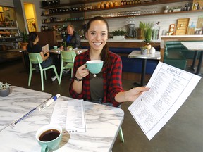 Server, Natalia Aleinati from Brekkie Cafe at 20 Westpark Link S.W. is excited to be opening up this week as they have changed procedures due to COVID-19 by social distancing and how they fill out the orders in Calgary on Monday, May 11, 2020.
