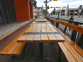 The outdoor patio tables at National on 17th in Calgary await potential customers on Tuesday, May 12, 2020.