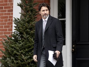 Prime Minister Justin Trudeau steps out of Rideau Cottage for a daily briefing with the media in Ottawa, Friday May 8, 2020.