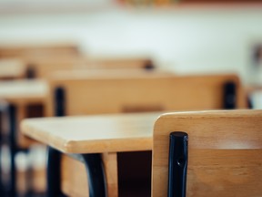 Back to school concept. School empty classroom, Lecture room with desks and chairs iron wood for studying lessons in highschool thailand without young student, interior of secondary education