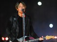 Keith Urban performs during the half-time show of the 107th Grey Cup Championship Game between the Winnipeg Blue Bombers and the Hamilton Tiger-Cats at McMahon Stadium on Nov. 24, 2019 in Calgary, Alta.
