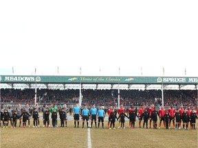 Teams Forge FC (L) and Cavalry FC are shown during the national anthem before kick off during leg 2 of the Canadian Premier League Championship  between Forge FC and Cavalry FC at ATCO Field at Spruce Meadows in Calgary on Saturday, November 2, 2019. Forge won 1-0 and were crowned league champions. Jim Wells/Postmedia