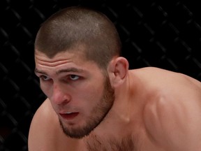 Khabib Nurmagomedov of Russia reacts against Michael Johnson of the United States in their lightweight bout during the UFC 205 event at Madison Square Garden on Nov. 12, 2016, in New York City.