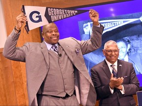 Georgetown athletic director Lee Reed introduces NBA Hall of Famer Patrick Ewing as the Georgetown Hoyas' new head coach at John Thompson Jr. Athletic Center on April 5, 2017 in Washington.