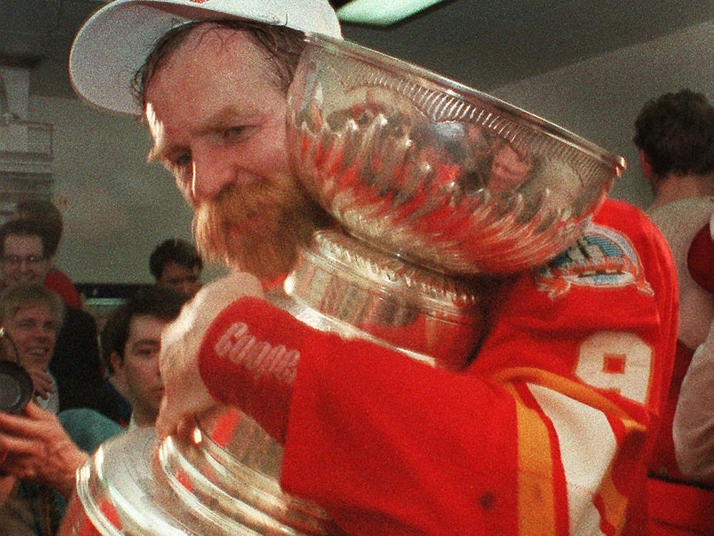 Al MacInnis hoisting the Stanley Cup following the Calgary's Cup