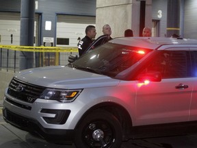 Calgary police block off the parkade at Eau Claire Market as officers investigate a fatal shooting on Friday, June 5, 2020. A man was found dead in the parkade after police received reports of shots fired just after 8 p.m. Brendan Miller/Postmedia