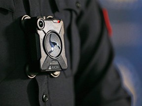 Calgary Police Service Staff Sgt. Travis Baker wears one of the service's new Axon body cameras on Tuesday July 3, 2018.