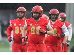 Dinos offensive lineman Logan Bandy was one of 24 football players to lock down Academic All-Canadian status this year. File photo by Jim Wells/Postmedia.