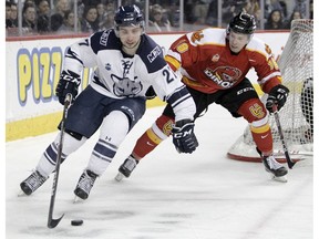 Cougar Connor Rankin skates with the puck as the Mount Royal Cougars faced off against the University of Calgary Dinos in the 2020 Crowchild Classic at the Saddledome on  Thursday, Jan. 30, 2020. Brendan Miller/Postmedia