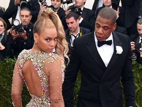 In this file photo taken on May 4, 2015 Beyonce and Jay Z arrive at the 2015 Metropolitan Museum of Art's Costume Institute Gala benefit in honor of the museums latest exhibit China: Through the Looking Glass in New York.