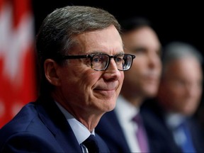 Bank of Canada governor designate Tiff Macklem attends a news conference with Canada's Minister of Finance Bill Morneau and current Bank of Canada governor Stephen Poloz on Parliament Hill in Ottawa Canada May 1, 2020.