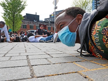 Several thousand Calgarians participating in an anti-racist rally lay down in downtown Calgary on Monday, June 1, 2020. The rally was in reaction to the death of George Floyd, 46, died after being arrested by police outside a shop in Minneapolis, Minnesota.  Gavin Young/Postmedia