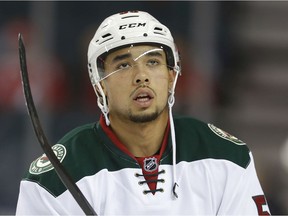 Minnesota Wild Matt Dumba in warm up before playing the Calgary Flames in NHL hockey in Calgary, Alta. on Wednesday February 18, 2015. Al Charest/Calgary Sun/QMI Agency