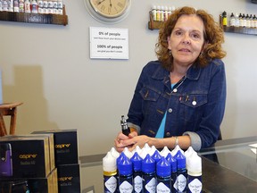 Co-Owner True Vape Inc., Janine Weisner as the provincial government set guide lines in Calgary on Tuesday, June 2, 2020.