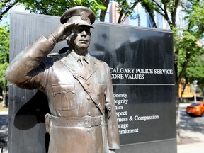 The Calgary police and fire statues at city hall were vandalized in Calgary on Saturday, July 4, 2020. Darren Makowichuk/Postmedia