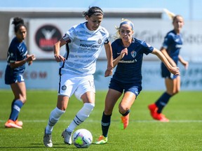 Christine Sinclair of Portland Thorns FC drives the ball down the field against the North Carolina Courage during the first round of the NWSL Challenge Cup at Zions Bank Stadium in Herriman, Utah.