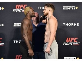 LAS VEGAS, NEVADA - JULY 31: In this handout image provided by UFC, (L-R) Opponents Derek Brunson and Edmen Shahbazyan face off during the UFC Fight Night weigh-in at UFC APEX on July 31, 2020 in Las Vegas, Nevada.