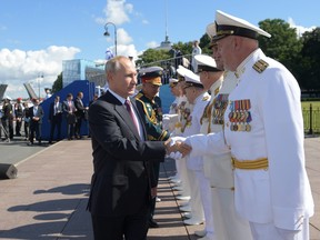 Russia's President Vladimir Putin attends the Navy Day parade in Saint Petersburg, Russia July 26, 2020.