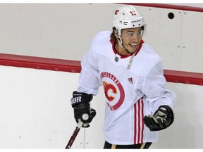 Calgary Flames forward Johnny Gaudreau smiles as he takes part in the teamÕs first practice since the COVID-19 shutdown at the Scotiabank Saddledome in Calgary on Monday, July 13, 2020.  Gavin Young/Postmedia