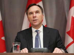 Federal Finance Minister Bill Morneau announced July 22, 2020, he had repaid more than $41,000 in travel expenses to a charity at the heart of the ethics commissioner's investigation into Prime Minister Justin Trudeau.