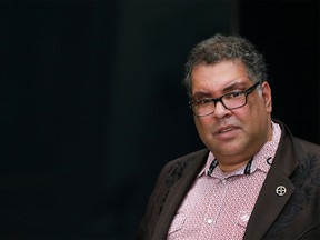 Calgary Mayor Naheed Nenshi speaks outside council chambers following the start of a committee hearing on racism on Tuesday, July 7, 2020.