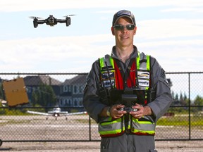 Chris Healy, owner of In-Flight Data, flies a drone at the Okotoks Air Ranch airport on Sunday, July 19, 2020. In-Flight Data recently received a one-year certificate from Transport Canada to operate drones beyond visual line of sight (BVLOS) for the purposes of public safety.